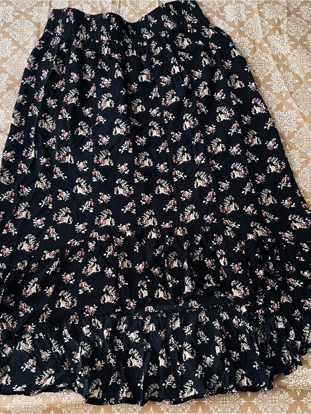 VILA Black Maxi Skirt with Pink and Cream Floral Print; asymmetrical hem.